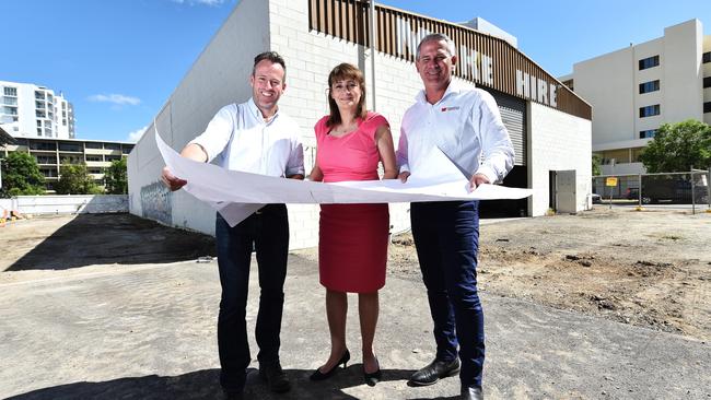 Chris Sheehan, a head brewer at Malt Shovel, at the site of the new Tiny Mountain microbrewery with mayor Jenny Hill and director of Phoenix Constructions Nathan Evennette. Picture: Zak Simmonds