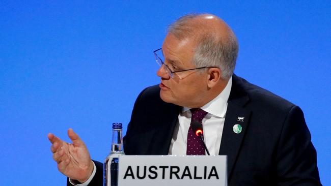 Using a stick would get Australians to buy more electric cars, but it wouldn’t get Scott Morrison re-elected. Picture: AFP