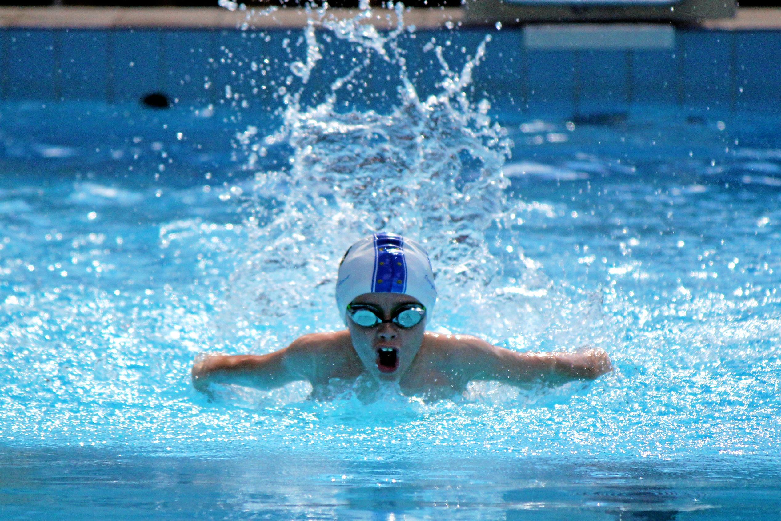 Jordie Que makes a splash in his butterfly event. Picture: Rebecca Devine 050819