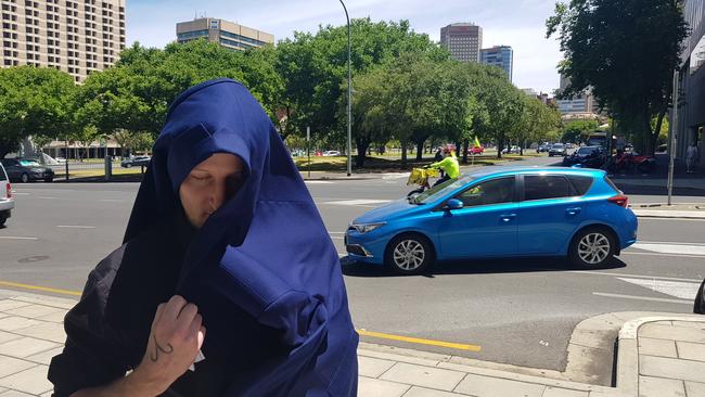 Superannuation scammer Christopher Lloyd George outside the Adelaide Magistrates Court. Picture: Sean Fewster