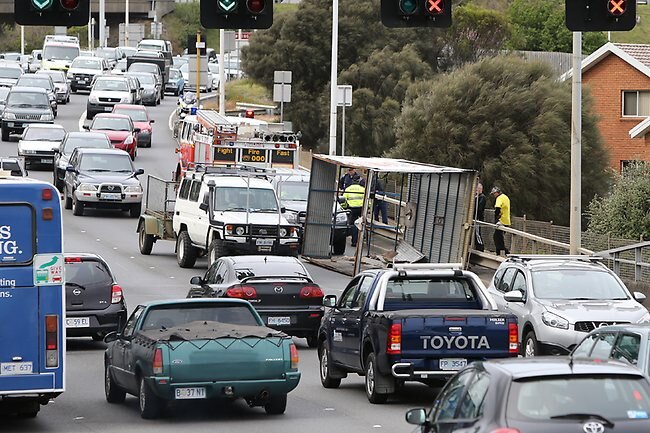 The back of a small rubbish truck blew off on the Tasman bridge creating traffic chaos for city-bound traffic. Picture: Sam Rosewarne