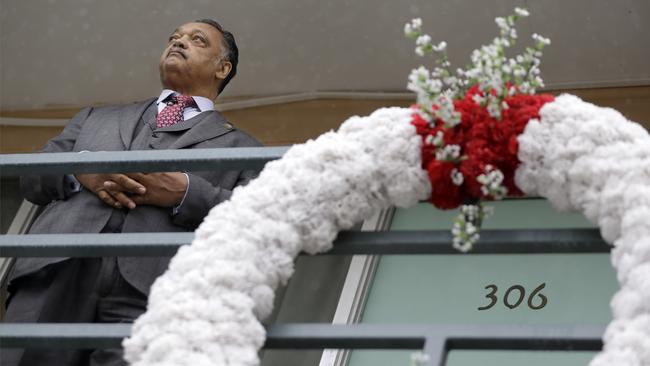 Rev. Jesse Jackson stands on the motel balcony where the Rev. Martin Luther King Jr. was assassinated. Picture: AP.