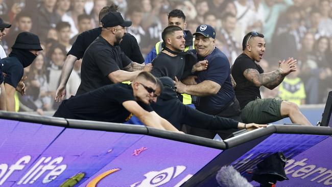 Fans storm the pitch in protest during the round eight A-League Men's match between Melbourne City and Melbourne Victory. Picture: Getty Images.