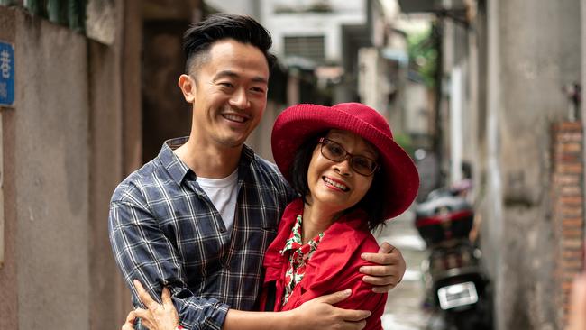 Benjamin Law and mother Jenny Law in a scene from the documentary TV series Waltzing the Dragon. Law has been named one of the most influential Asian-Australians under 40. Picture: ABC-TV.