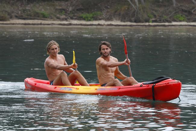 Gold Coast Suns players Jeremy Sharp (left) and Lachie Weller (right) training at Palm Beach. Picture: Tertius Pickard