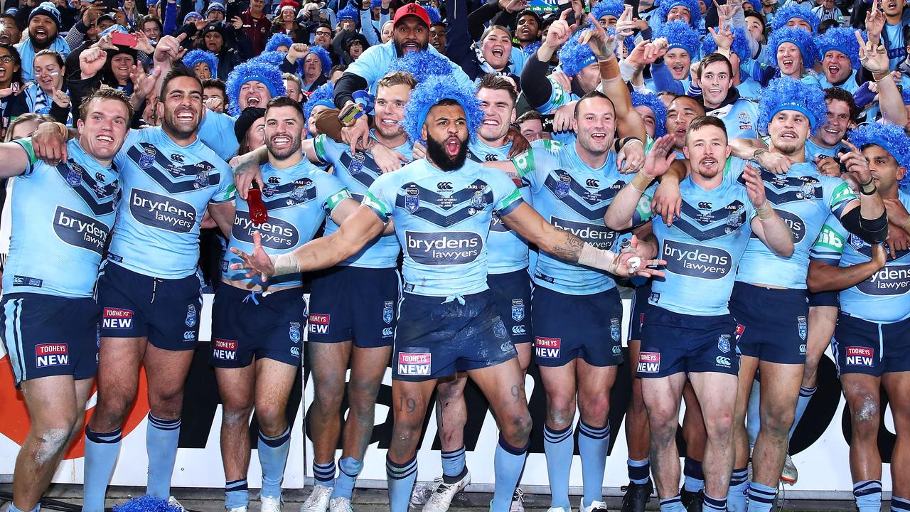 The Blues celebrate victory after game two of the State of Origin series. (Photo by Mark Kolbe/Getty Images)