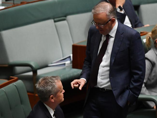 CANBERRA, AUSTRALIA - FEBRUARY 02: Leader of the Opposition Anthony Albanese (R) speaks with the Member for Maribyrnong Bill Shorten during Question Time in the House of Representatives at Parliament House on February 02, 2021 in Canberra, Australia. Federal Members of Parliament from Western Australia, including some of the most senior members of the government, have been allowed to attend Parliament this week after being granted an exemption by ACT Health. Parliamentary officials and ACT Health met on Monday morning to negotiate the terms of the exemptions, which don't include Government staff. (Photo by Sam Mooy/Getty Images)