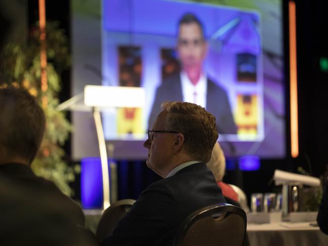 Wednesday 20th July 2022.  The Australian.The Governor of the Reserve Bank of Australia, Philip Lowe watching the address by the Treasurer Jim Chalmers at The Australian Strategic Business Forum in partnership with BHP.Photograph by Arsineh Houspian