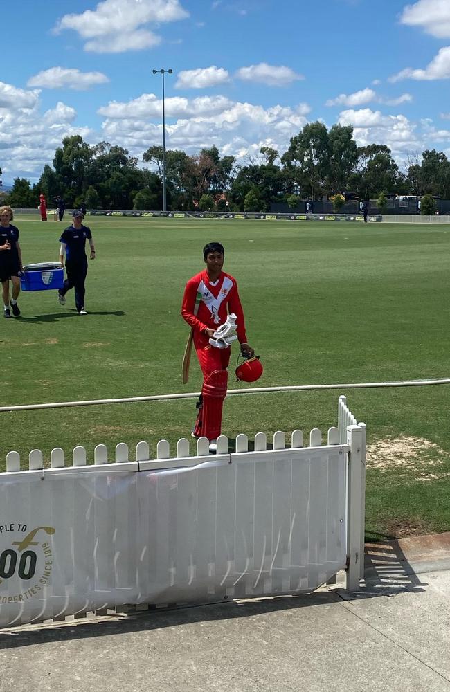 Atharv Deshpande walks off after his century against Prahran.