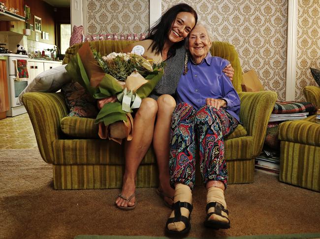 Emporio Home and Flowers employee Megan Leseberg delivers fresh blooms to 91-year-old Cynthia Lane. Picture: Sam Ruttyn