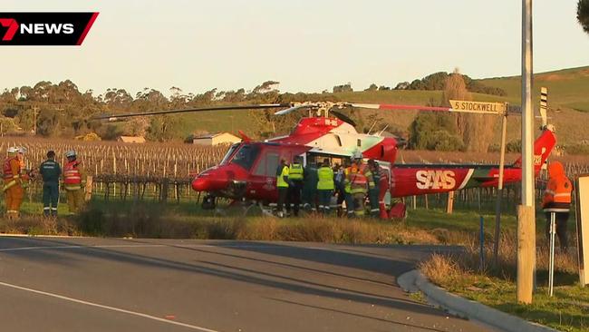 A driver was flown to hospital after his car collided with a school bus at Penrice in the Barossa Valley. Picture: 7NEWS