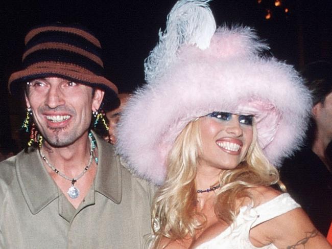 NEW YORK - SEPT 1999: Pamela Anderson poses for a picture with husband Tommy Lee on September 9, 1999 at the MTV Video Music Awards in New York City. Anderson got her start as a Playboy Playmate before moving on to Labatt's commercials, a part in Home Improvement, before starring in Baywatch. (Photo by Evan Agostini/Liaison)