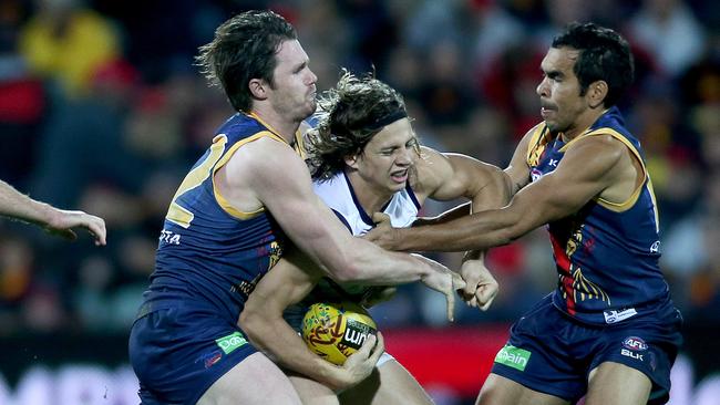 Dangerfield tackles Fyfe when they clashed in 2015. Picture: Simon Cross