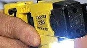 A taser was allegedly used in the burglary.