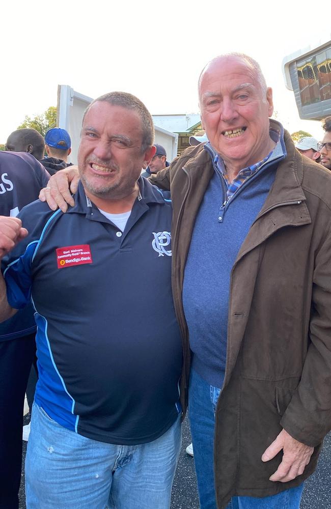 Prahran scorer James Higgs with long-serving former president Ian Crawford.