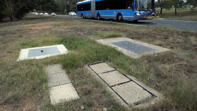 A Telstra cable pit that gives access to ICON, the Intra Government Communications Network, on the side of a road in Canberra.