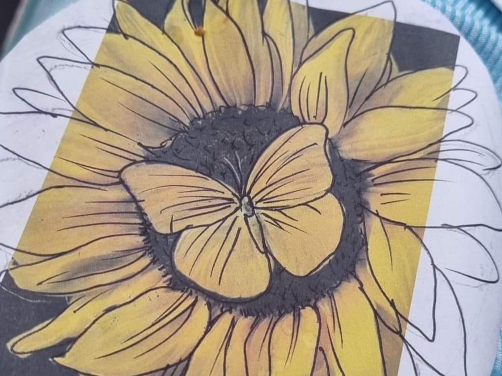 Ms Cowley's mother got a tattoo of a sunflower to remember her daughter. Image: Facebook