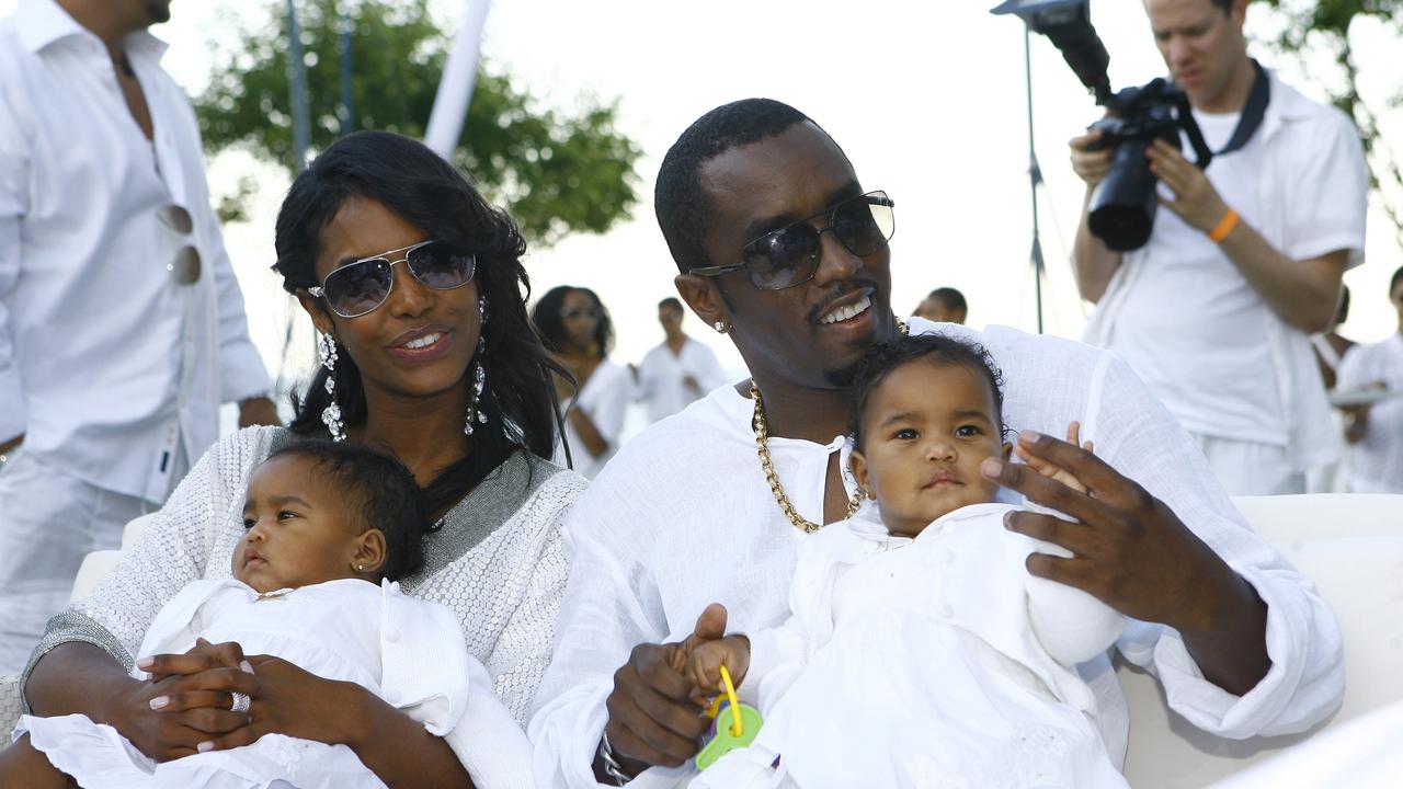 Host Sean "Diddy" Combs and Kim Porter with twin daughters D'Lila Star Combs and Jessie James Combs at their East Hampton estate on September 2, 2007 in East Hampton, New York. Picture: Getty