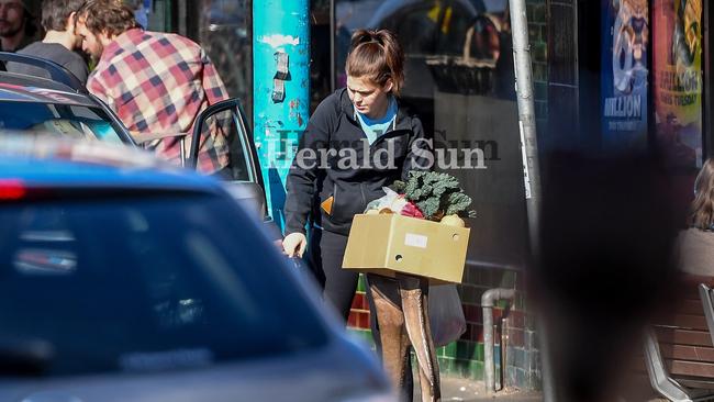 Disgraced wellness blogger Belle Gibson shopping at an organic food store in Northcote last year. Picture: Jake Nowakowski