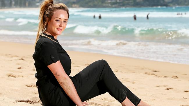 Geordie Shore reality TV star Charlotte Crosby poses during a photo shoot at Manly Beach. Picture: Troy Snook