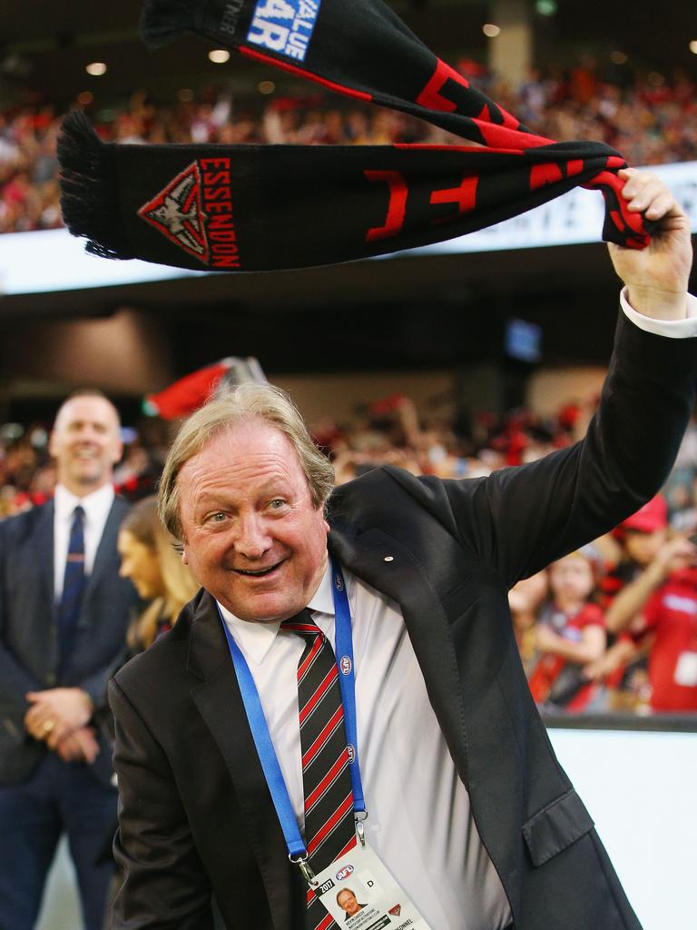 Bombers legend Kevin Sheedy waves his jacket during round one in 2017. Picture: Michael Dodge/Getty Images