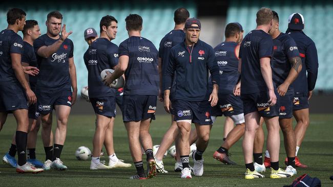 The SCG surface got a lot of attention from Sydney Roosters players during their training session on September 30. Picture: Bianca De Marchi/AAP