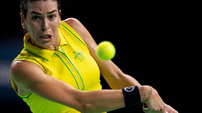 Ajla Tomljanovic returns the ball against Slovakia's Rebecca Sramkova. (Photo by JORGE GUERRERO / AFP)