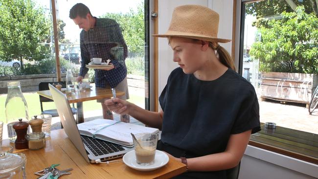 Bronte Gale enjoys a quality coffee at Rudimentary, which has developed a loyal customer base after two years in Footscray. Picture: David Crosling