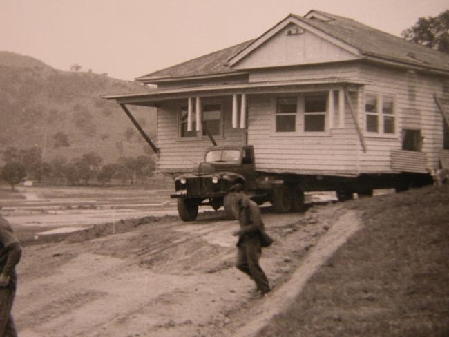 The first home to be relocated inches its way toward a new resting place at Tallangatta in 1955.