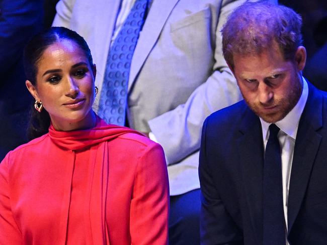 (FILES) In this file photo taken on September 5, 2022 Britain's Meghan, Duchess of Sussex and Britain's Prince Harry, Duke of Sussex, react as they attend the annual One Young World Summit at Bridgewater Hall in Manchester, northwest England. - Prince Harry and his wife Meghan are being evicted from their home on the British royal family's Windsor estate, leaving them without a UK base, reports said on March 1, 2023. Frogmore Cottage, which they refurbished at a reported cost of Â£2.4 million ($2.9 million), had been a wedding present from the late Queen Elizabeth II in 2018. It has now been offered to Prince Andrew, King Charles III's disgraced brother, reports in The Sun and Daily Telegraph said. (Photo by Oli SCARFF / AFP)