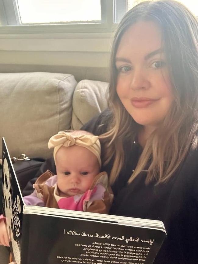 Photograph posted on TBMMBEKIND Facebook page on May 3, 2024: Tayla loved to read to Murphy, it was special bonding time for them both and Murphy, just like her Mumma was going to be the smartest little girl!