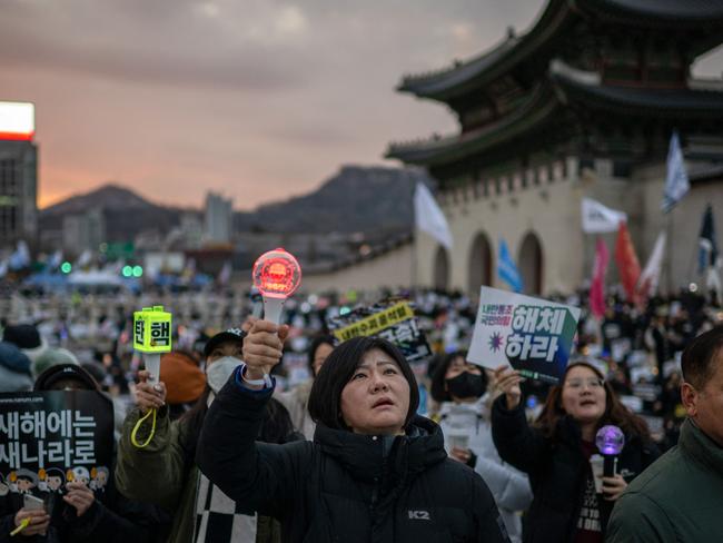 An arrest warrant has been issued for the impeached leader. Picture: Philip Fong/AFP