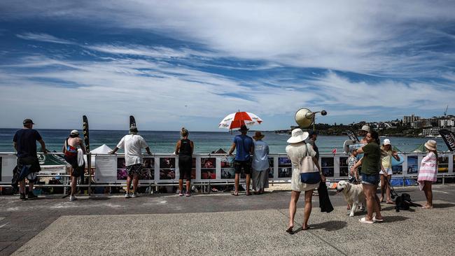 Visitors to Sydney’s Bondi Beach enjoy the arrival of higher summer temperatures. Picture: NCA Newswire/Flavio Brancaleone