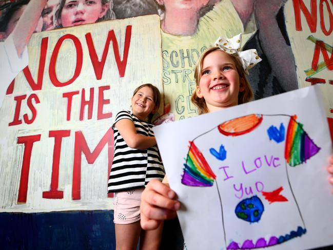 Pearl Wright 8 and Silke Slaughter 5 check out the "Now is the Time" exhibit in the Children's Art Centre at Goma for the reopening. Pics Adam Head