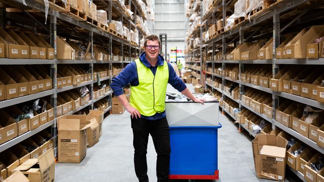 One time Geelong Cats worker Ben Waller turned Cotton On worker in 2020 at its Avalon distribution centre.