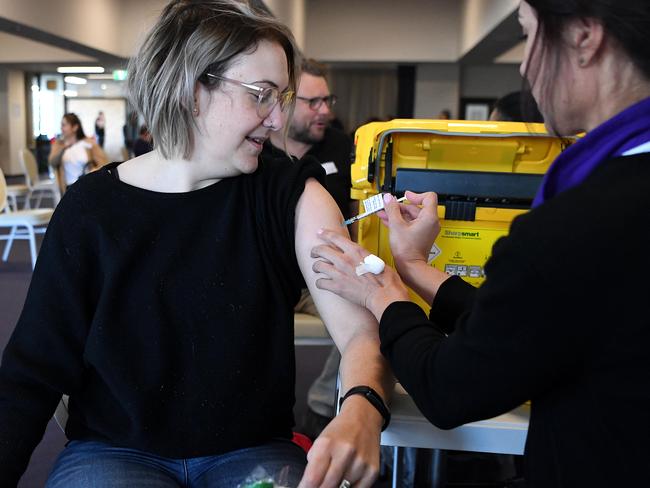 Natalie Tomlin receives the Pfizer Covid-19 vaccine at Doomben Racecourse. Picture: NCA NewsWire / Dan Peled