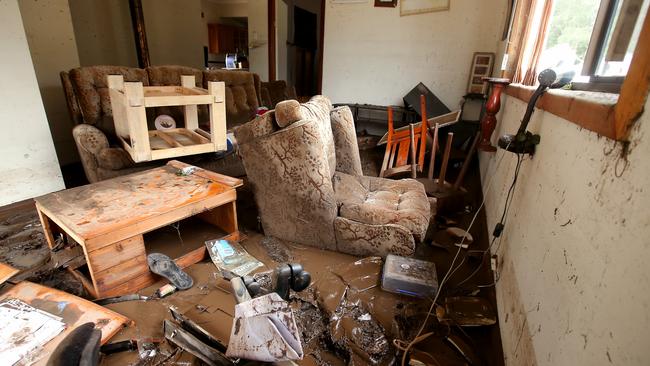 The owners of homes, like this one in Telegraph Point, returned to scenes of devastation. Picture: Nathan Edwards
