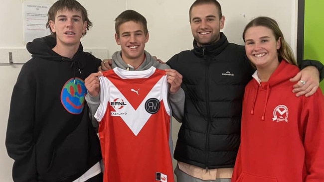 Hunter Hodgson (second left) with his siblings prior to the match. Picture: Warrandyte FC