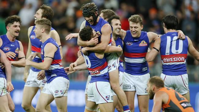 Western Bulldogs players celebrate on the final siren. Picture: Michael Klein