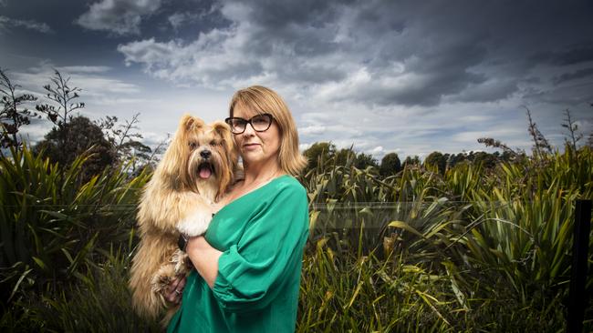 Dog breeder Trudi Counsell and eight-month-old Lhasa Apso named Remy. Picture: LUKE BOWDEN