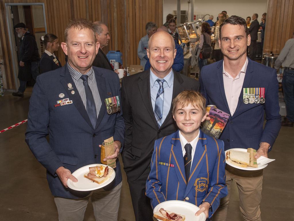 (from left) Anthony Clark, Murray Gladwin, Charlie Gladwin and Tim Guse line up for the Gunfire breakfast at The Goods Shed on ANZAC DAY. Tuesday, April 25, 2023. Picture: Nev Madsen.