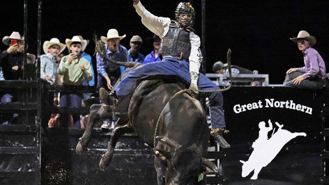 Travis Shaw competes in the Great Northern Bull riding series bull ride event at the Mossman Showgrounds. Picture: Stephen Harman