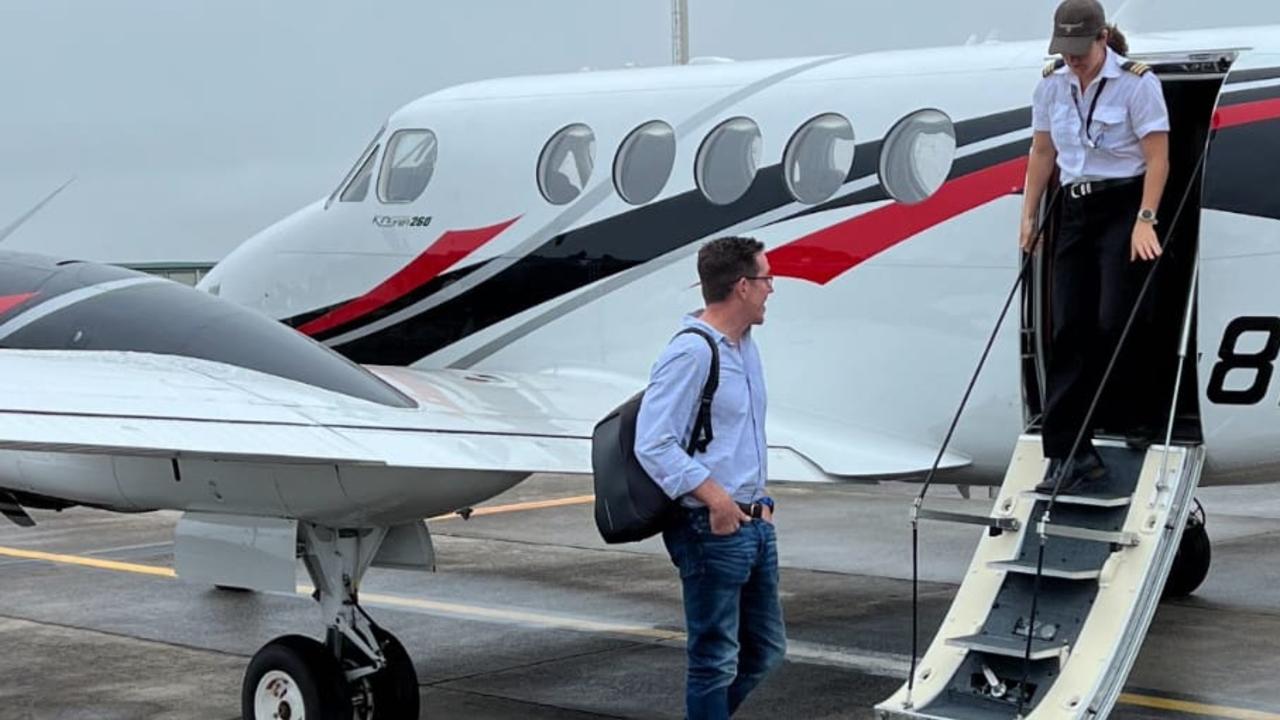 WealthCheck boss Sam Mitchell boarding a flight before the collapse of his cattle business.