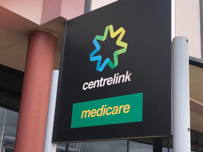 People had to wait in a two-hour queue outside the Centrelink office at Brookvale so they could sign on for Federal Government financial assistance after losing their jobs because of COVID-19 shutdown. Picture: Jim O'Rourke