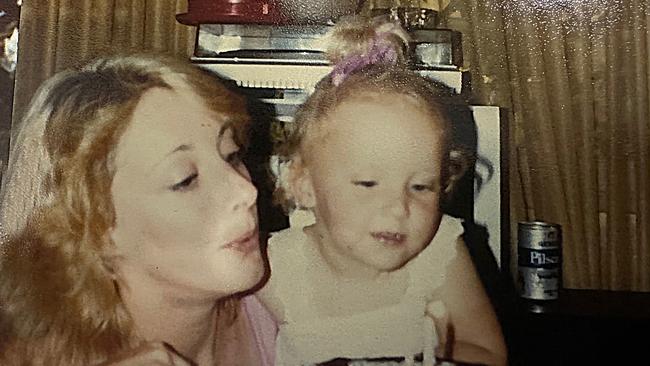 Bronwyn Winfield and Chrystal blowing out a candle. Witnesses say Bronwyn was a devoted mother who would not have deliberately abandoned her two daughters.