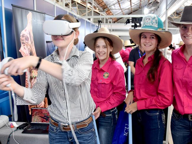 BEEF AUSTRALIA 21: Clare Hills (left) from Rockhampton Girls Grammar tries out the virtual reality meat processing system