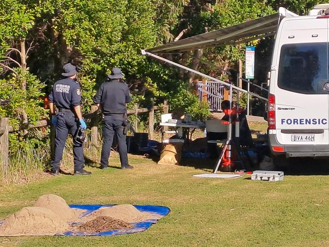 Forensic police at the Coffs Harbour scene where human remains were found on Tuesday. Picture: Toni Moon.