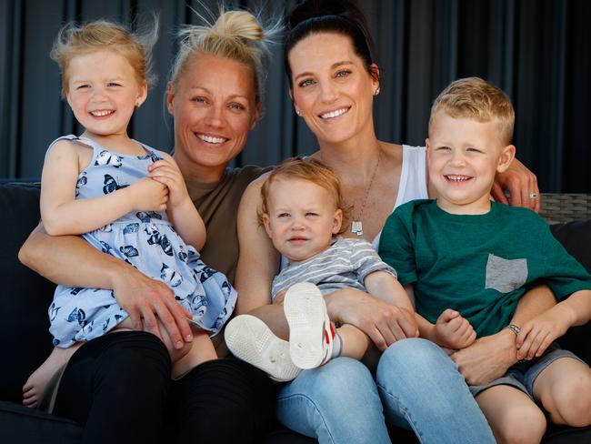 Erin Phillips with wife Tracy Gahan and children Brooklyn 4, Drew 16 months and Blake 4 at home. Picture: Matt Turner