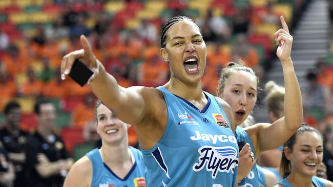 TOWNSVILLE, AUSTRALIA - DECEMBER 20: Elizabeth Cambage of the Flyers celebrates with team mates after their victory during the WNBL Grand Final match between the Southside Flyers and the Townsville Fire at the Townsville Stadium, on December 20, 2020, in Townsville, Australia. (Photo by Ian Hitchcock/Getty Images)