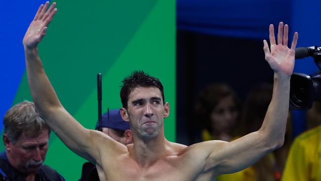 RIO DE JANEIRO, BRAZIL — AUGUST 13: Michael Phelps of the United States thanks the crowd after winning gold in the Men's 4 x 100m Medley Relay Final on Day 8 of the Rio 2016 Olympic Games at the Olympic Aquatics Stadium on August 13, 2016 in Rio de Janeiro, Brazil. (Photo by Clive Rose/Getty Images)
